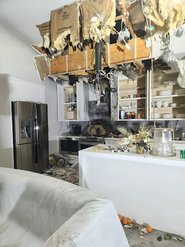 Before: Fire and smoke damaged kitchen in a Boca Raton Florida home